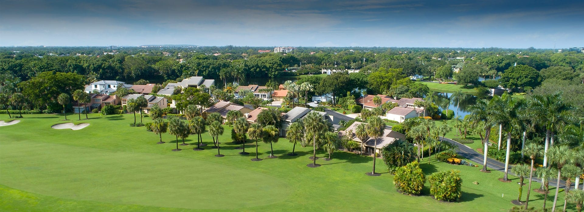 Cedarwood patio homes in Boca West with view of the golf course