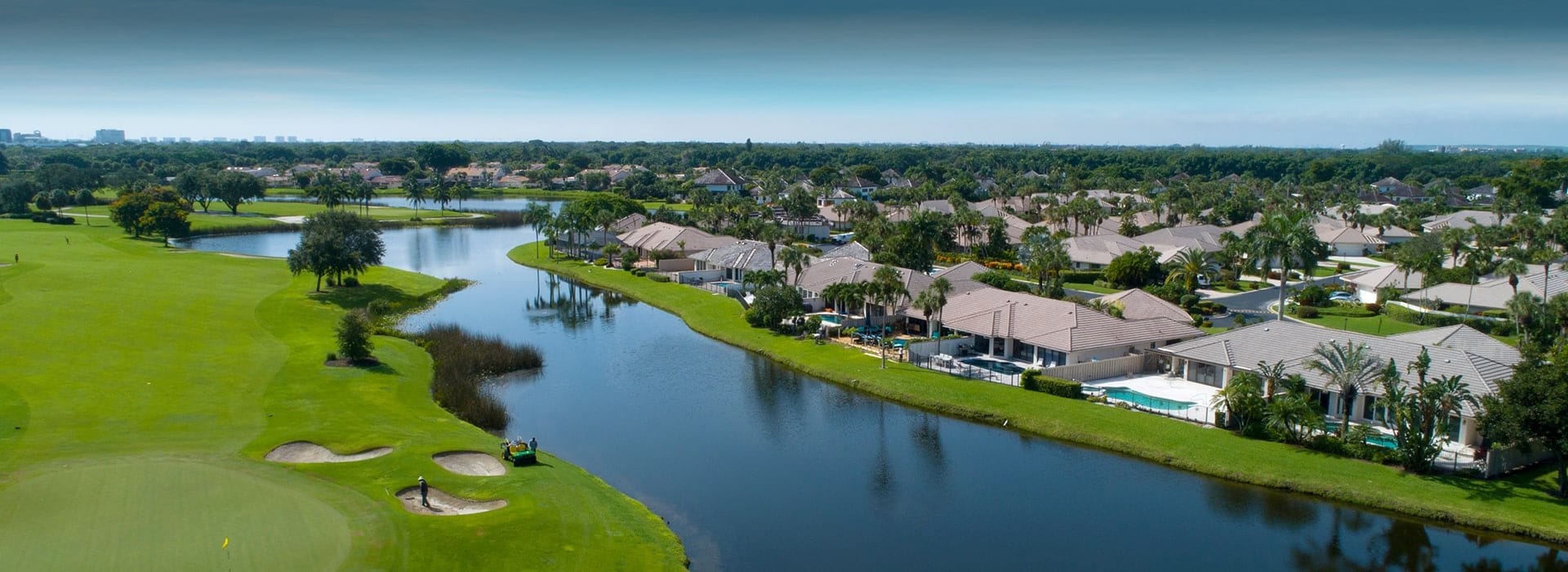 Cypress Point semi-attached and stand-alone villas at Boca West overlooking the water and golf course
