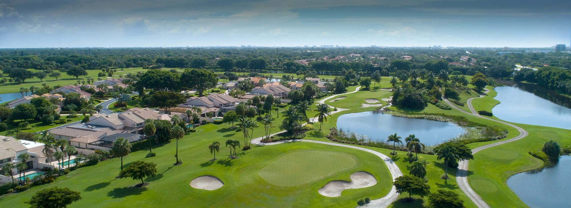 Boca West's Cypress Walk attached townhomes with golf course views