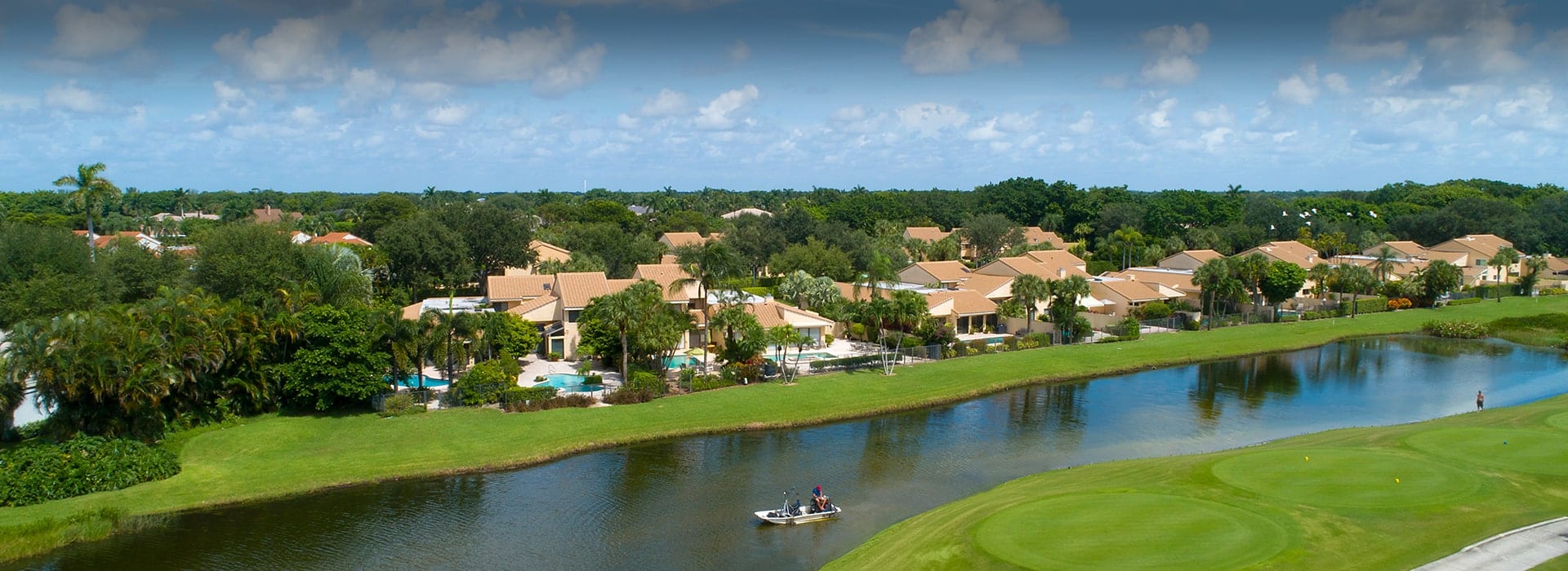 Fairway Oaks attached villas at Boca West with views of the lake and golf course
