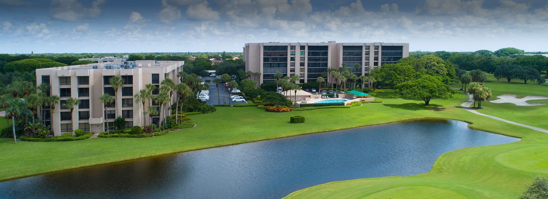 Laurel Oaks at Boca West mid-rise condominiums with water views