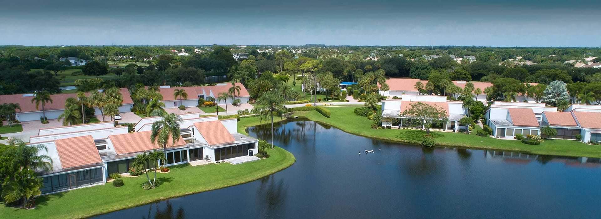 Peppertree villas of Boca West with views of water