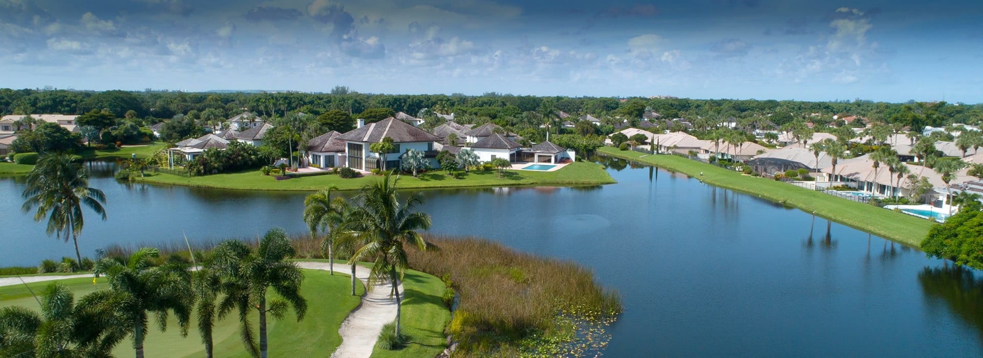 Boca West one or two-story single family homes in The Pointe along golf fairway