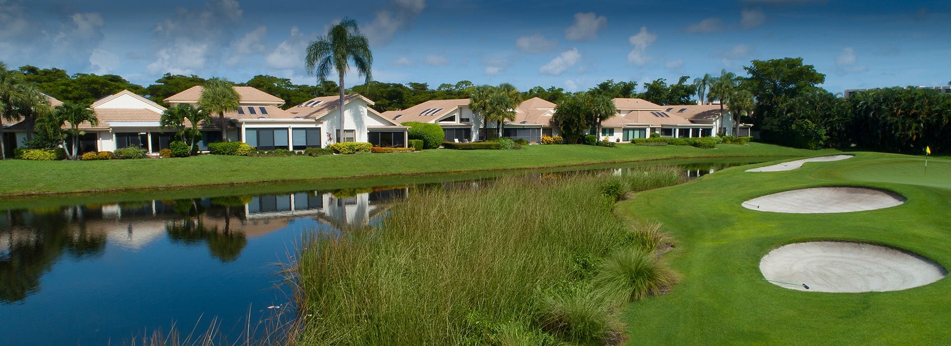 Boca West Waters Edge villa neighborhood with golf course views