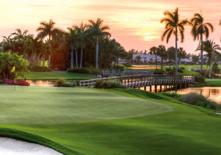 The green of Boca West's Dye IV 18th hole at sunrise