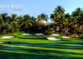 Boca West Golf Course with Palm trees and blue skies
