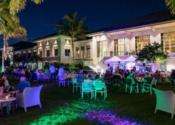 night event on lawn at boca west with tables and tents