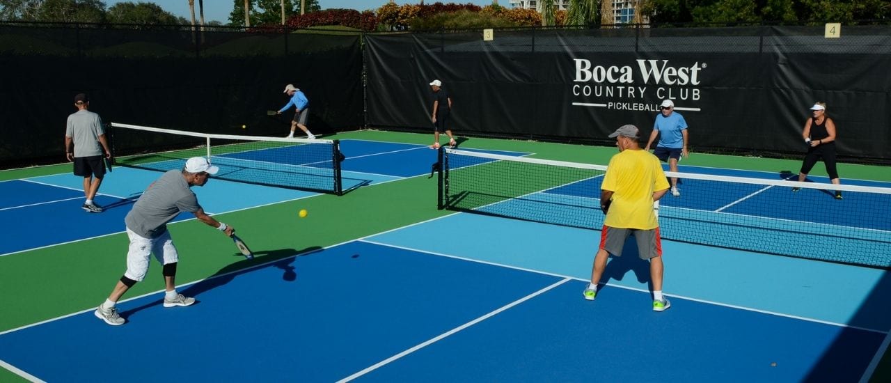 boca west men playing pickelball