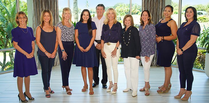 boca west realty sales team group photo